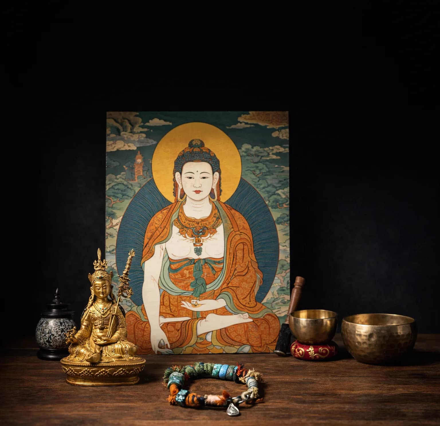 A Nepali monk working on a Thangka painting